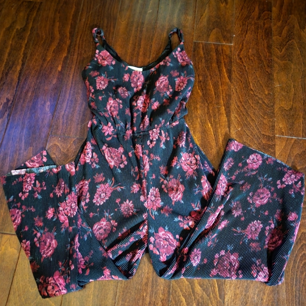 Black and red floral capri pants jumper/romper.  Size small